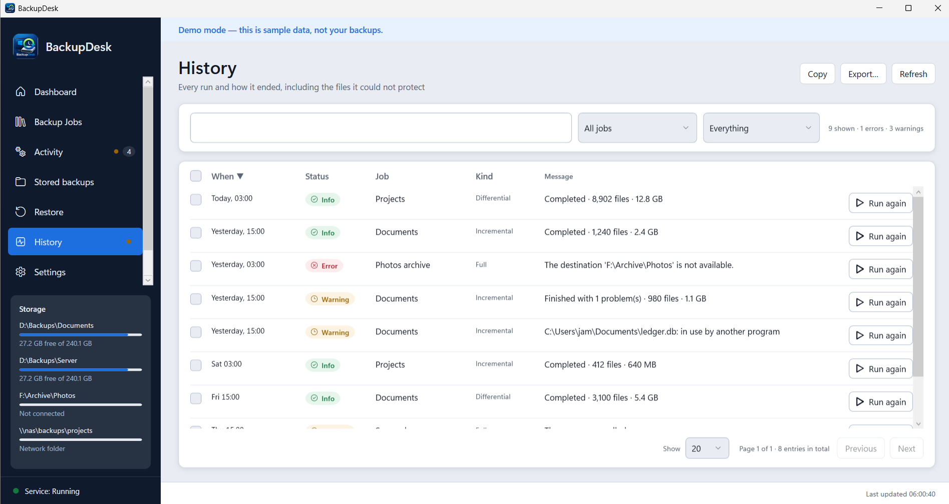 The History view listing every run with its status, job, backup level and message, including warnings for files that were in use