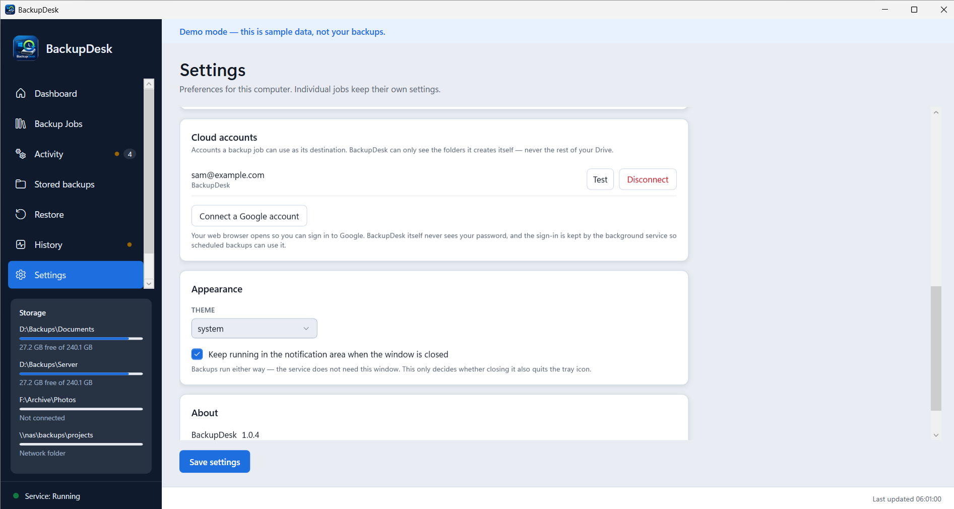 The Settings screen showing a connected Google account for cloud destinations, theme options and the notification area preference