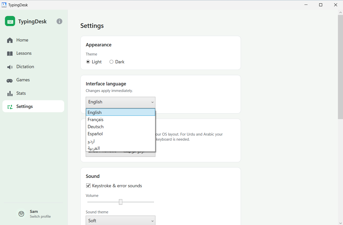 The Settings screen with a Light and Dark theme choice and the Interface language list open, listing English, Fran&ccedil;ais, Deutsch, Espa&ntilde;ol, اردو and العربية, with a Sound section below offering keystroke and error sounds, volume and a sound theme